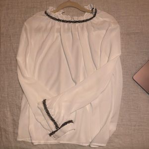 White sheer top with fringe detail